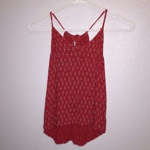 red flowy tank
